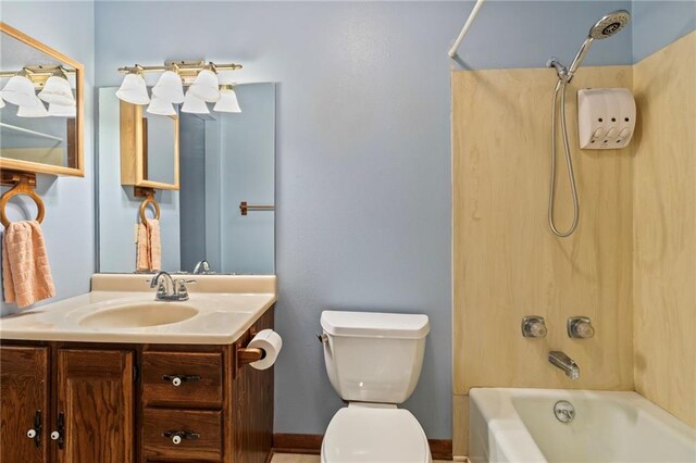 full bathroom featuring shower / bath combination, toilet, and vanity