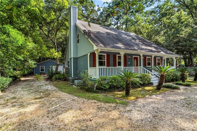 view of property exterior with a porch