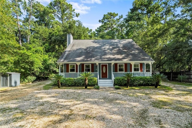 cape cod home with covered porch