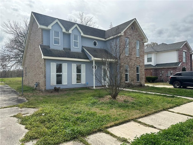 view of front property with a front lawn