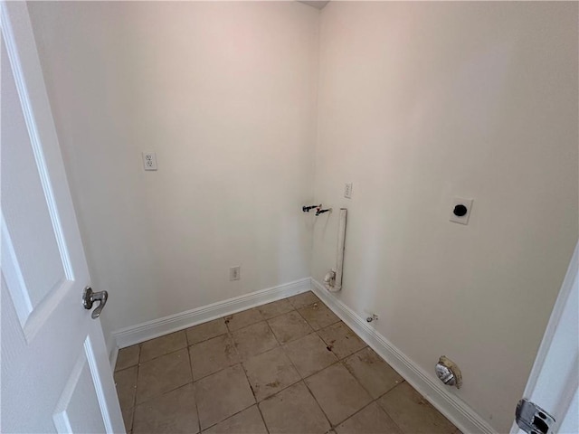 laundry room with gas dryer hookup, light tile patterned floors, washer hookup, and electric dryer hookup