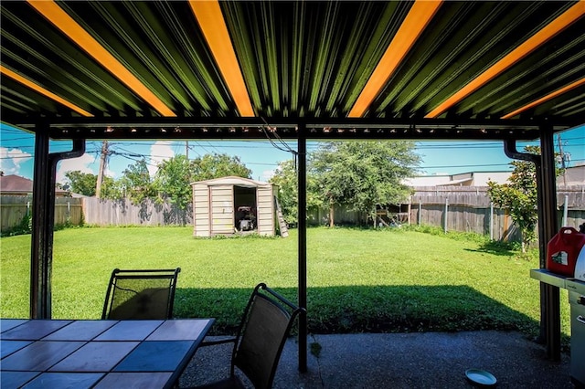 view of yard with a storage shed