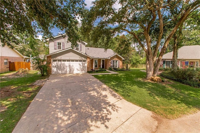 view of front of home featuring a garage and a front yard