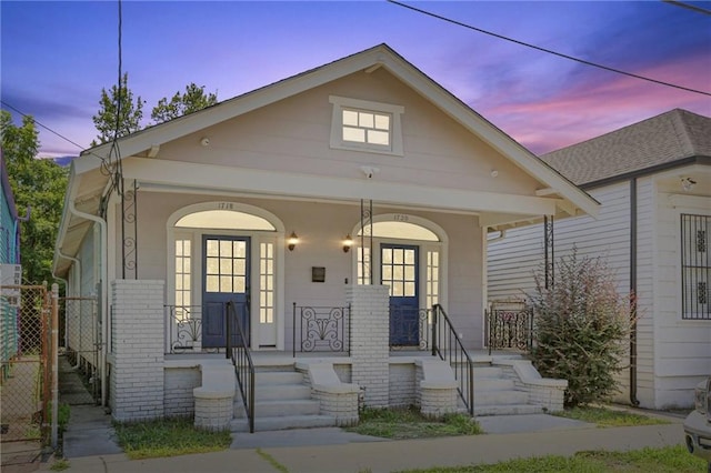 bungalow-style house with covered porch