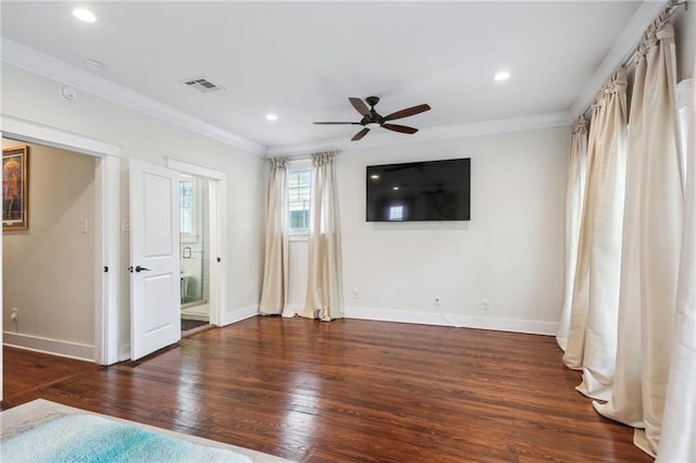 unfurnished bedroom with ensuite bath, ceiling fan, crown molding, and dark wood-type flooring