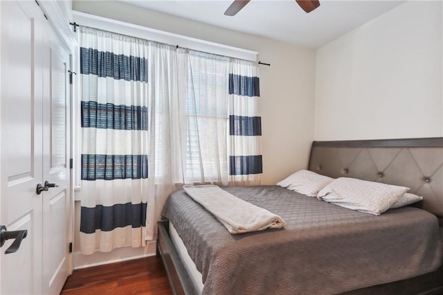 1720 Lapeyrouse St, New Orleans, LA 70116 - bedroom with wood finished floors and a ceiling fan