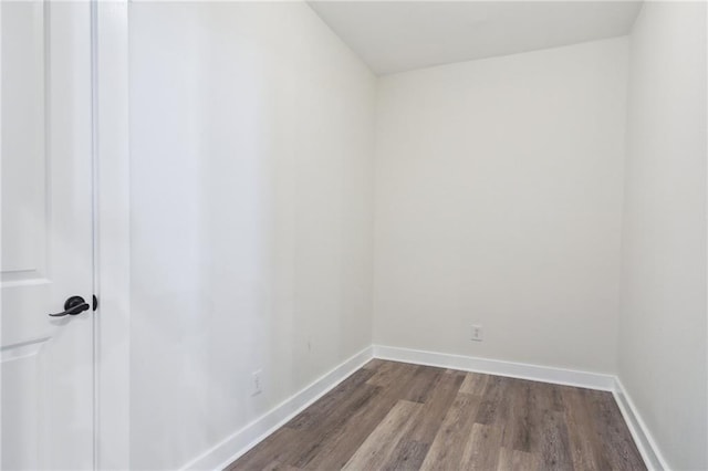 spare room featuring hardwood / wood-style flooring