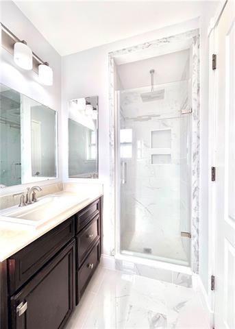 1112 Michael St, Marrero, LA 70072 - bathroom featuring vanity and an enclosed shower