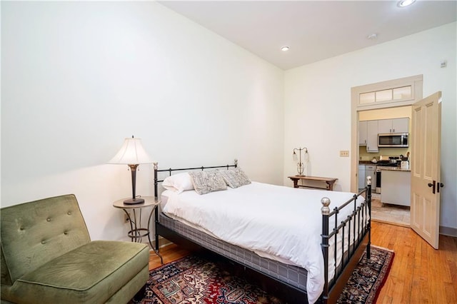 bedroom featuring light hardwood / wood-style floors