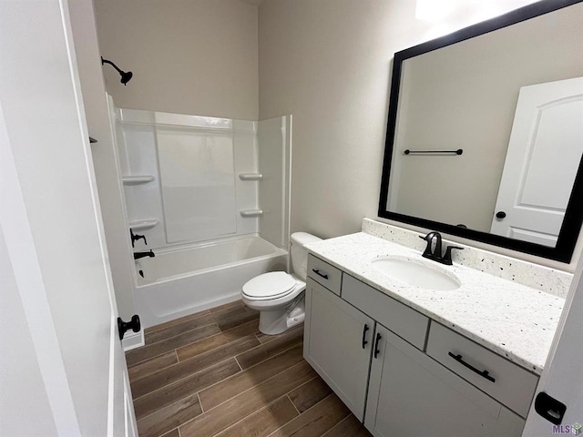 full bathroom with vanity, toilet, shower / bathing tub combination, and wood-type flooring