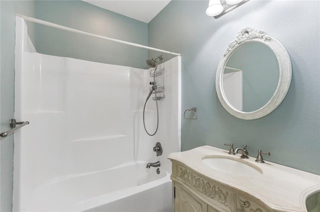 bathroom with vanity and shower / bathtub combination