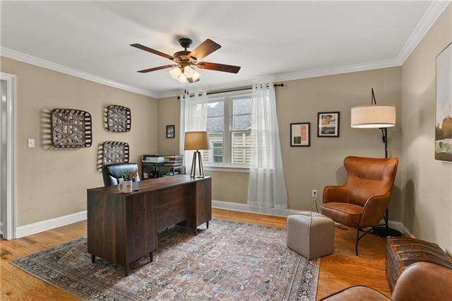 office space featuring ceiling fan, hardwood / wood-style flooring, and ornamental molding