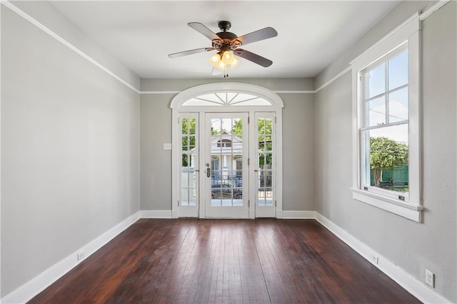 entryway featuring ceiling fan and dark hardwood / wood-style flooring