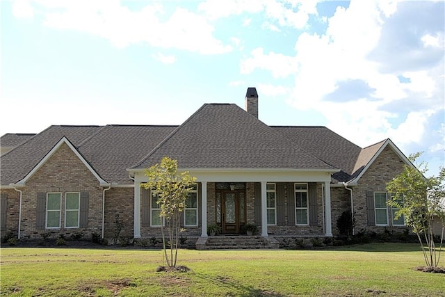 view of front of home featuring a front lawn