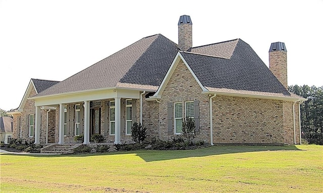 exterior space with a front lawn