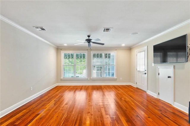 unfurnished living room featuring crown molding, hardwood / wood-style floors, and ceiling fan