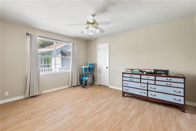 interior space with light hardwood / wood-style floors and ceiling fan