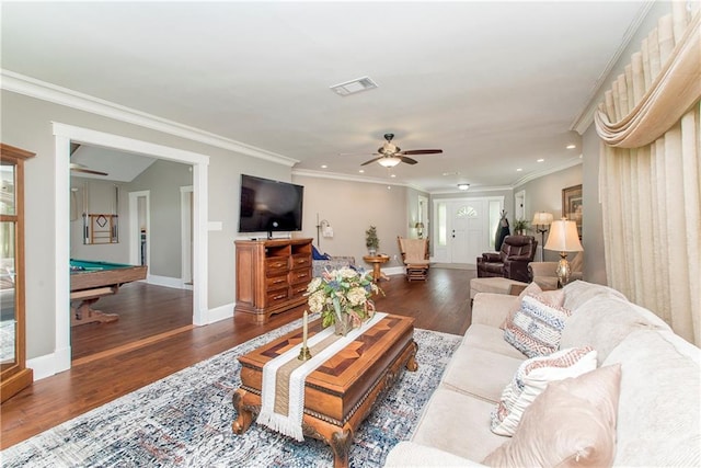 living room featuring ceiling fan, crown molding, dark hardwood / wood-style flooring, and pool table