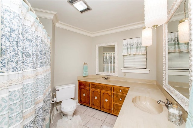 bathroom featuring ornamental molding, vanity, tile patterned floors, and toilet