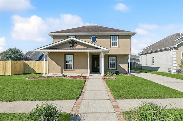 front facade with a front yard