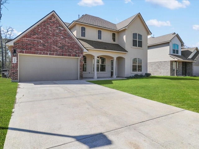 view of front property with a front yard and a garage