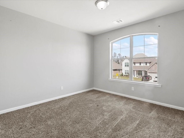 empty room featuring carpet