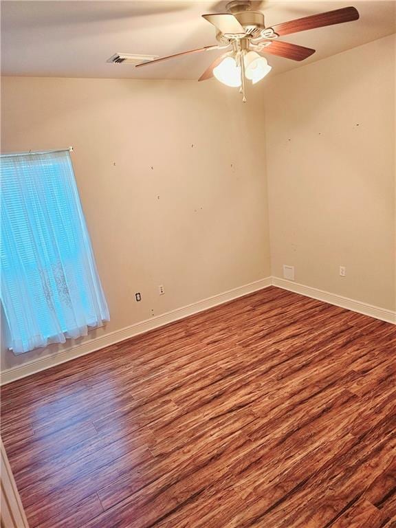 669 Lake Iberville Ct, Ponchatoula, LA 70454 - unfurnished room with wood finished floors, a ceiling fan, and baseboards