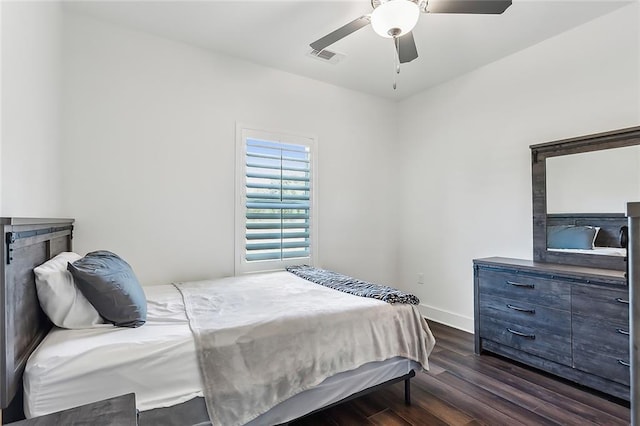 bedroom featuring dark wood-type flooring and ceiling fan