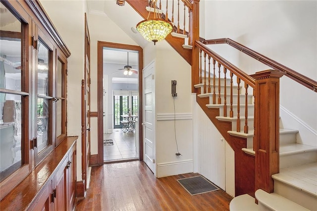 entrance foyer featuring hardwood / wood-style flooring and ceiling fan