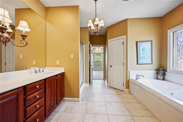 bathroom with vanity, a chandelier, plus walk in shower, and tile patterned flooring