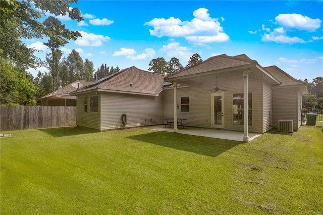 back of property featuring a fenced backyard, central air condition unit, a patio area, ceiling fan, and a yard
