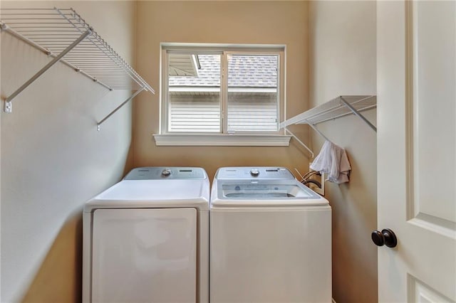 laundry room featuring independent washer and dryer