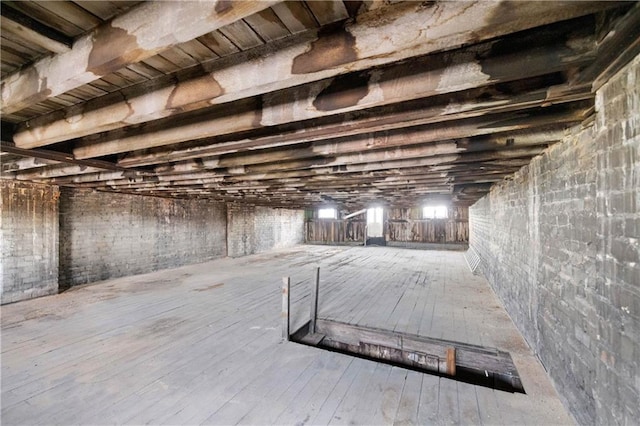 miscellaneous room featuring hardwood / wood-style flooring