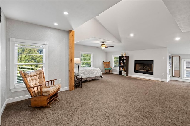 carpeted bedroom with lofted ceiling and ceiling fan