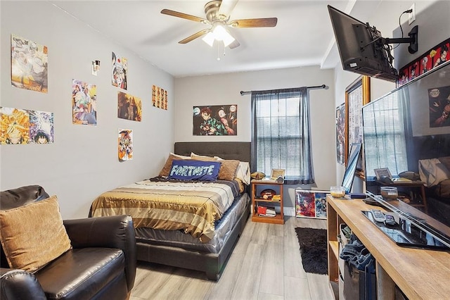 bedroom featuring ceiling fan and light hardwood / wood-style floors