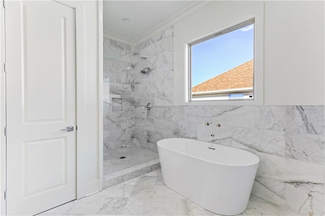 bathroom featuring ornamental molding, tile walls, and shower with separate bathtub