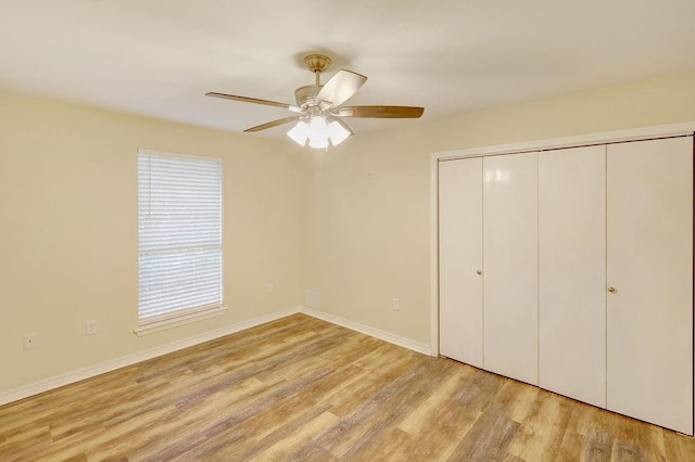 unfurnished bedroom with a closet, ceiling fan, and light hardwood / wood-style floors