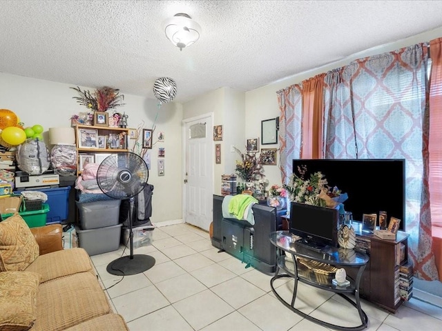 tiled living room with a textured ceiling