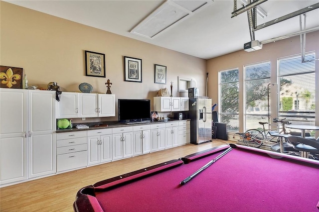 recreation room featuring pool table and light hardwood / wood-style floors