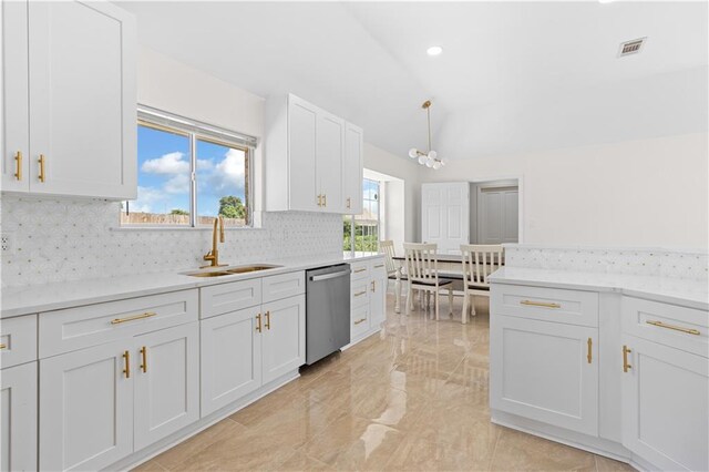 kitchen featuring decorative backsplash, light tile patterned floors, dishwasher, and a wealth of natural light