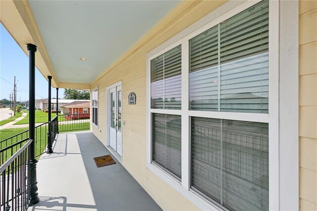 view of patio featuring a porch