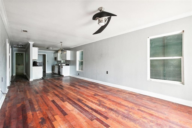 unfurnished living room featuring ceiling fan, crown molding, and wood-type flooring