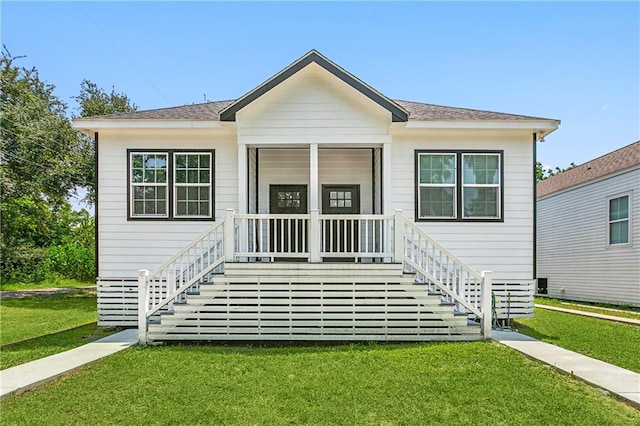 view of front of property with a front yard