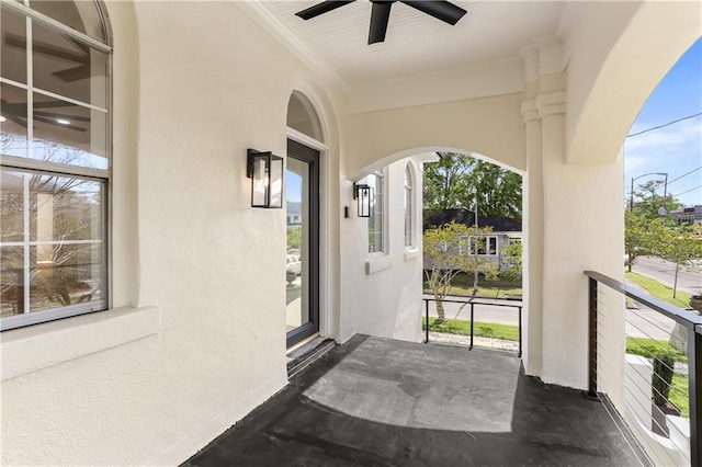 property entrance featuring ceiling fan