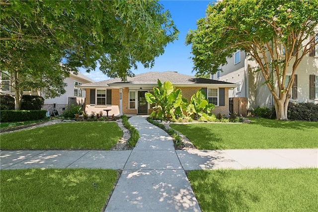 view of front facade with a front lawn