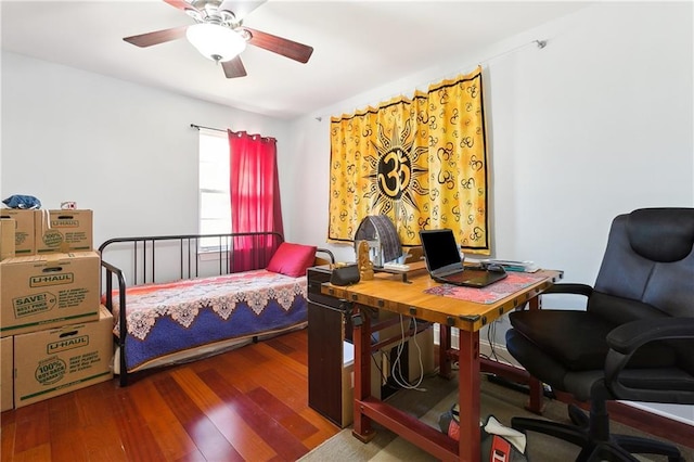 bedroom featuring wood-type flooring and ceiling fan