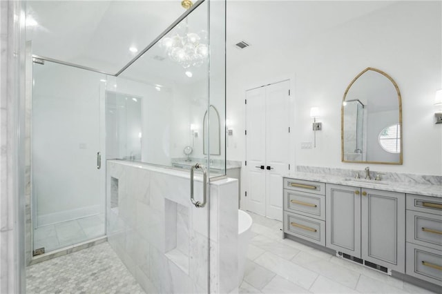 bathroom with vanity and plus walk in shower