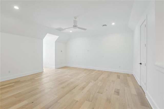 bonus room with ceiling fan, lofted ceiling, and light hardwood / wood-style flooring