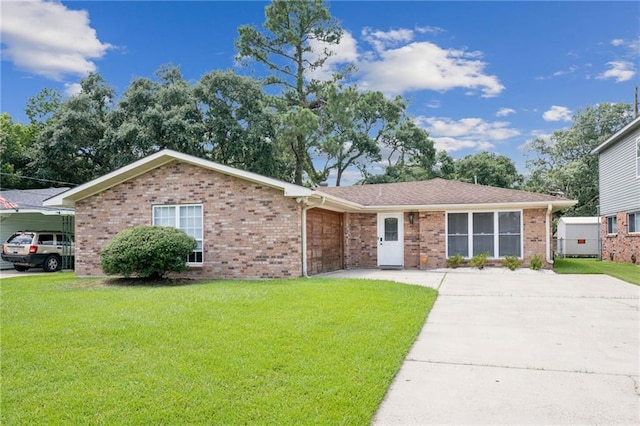 ranch-style home with a front lawn