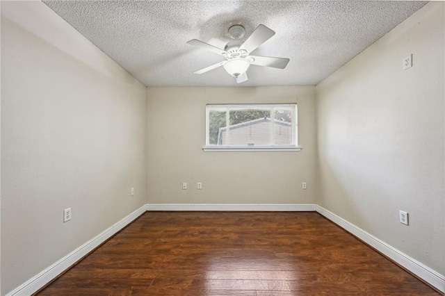 empty room featuring ceiling fan, a textured ceiling, and hardwood / wood-style floors